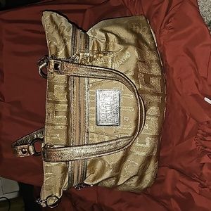 Coach Poppy Gold.  Like new.